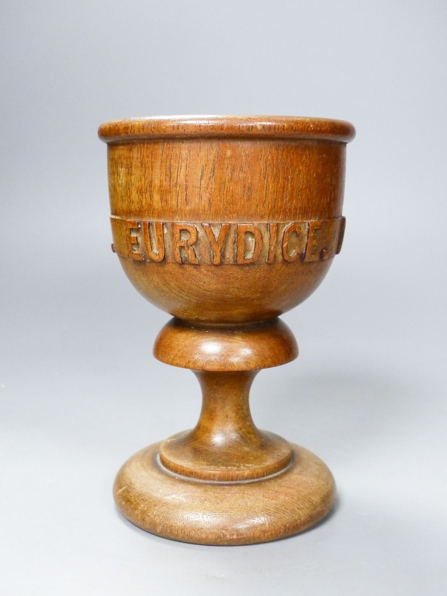 A turned and carved wood goblet made from the timber of the ship Eurydice and dated March 24th 1878, 15cm 15cm